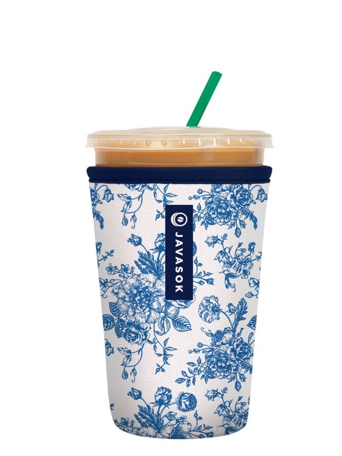 A Sok-It blue toile insulated sleeve on an iced coffee