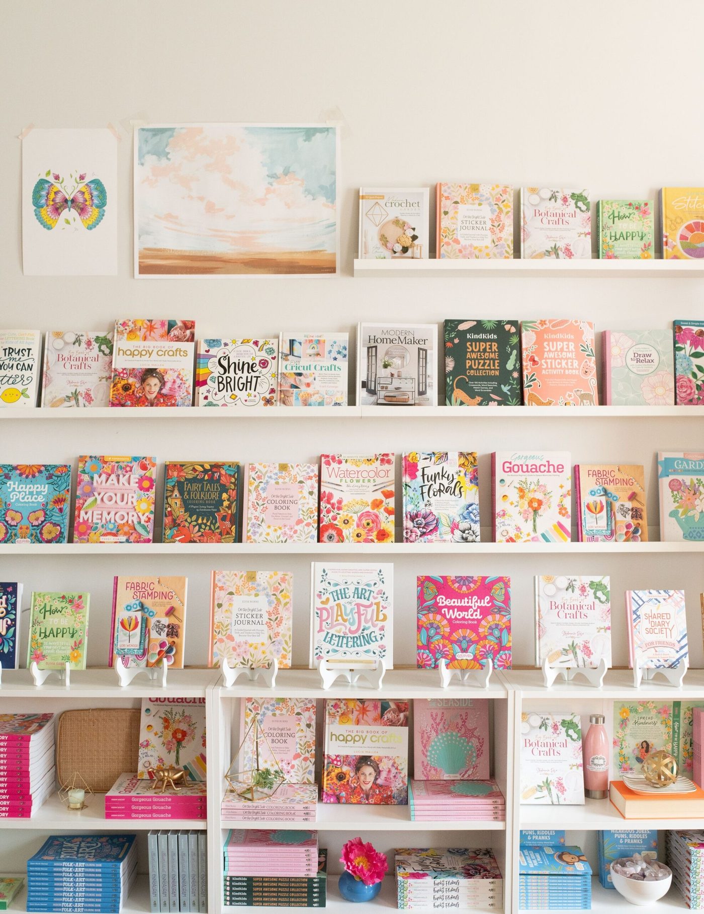 Schiffer Publishing craft and coloring books faced out on white shop shelves
